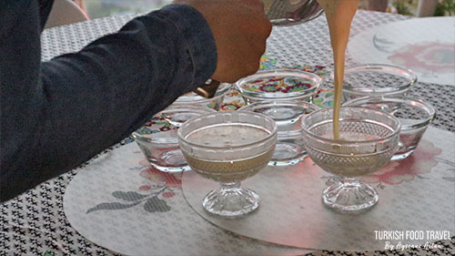 Pouring the keshkul pudding